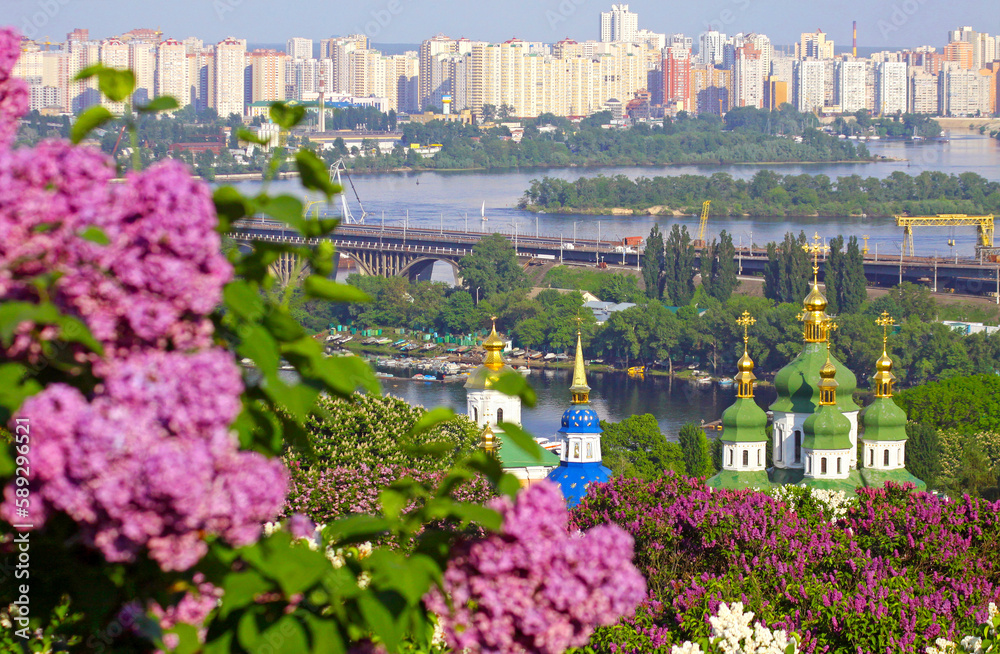 Kiev Botanical Garden in spring. View to the Vydubichi monastery