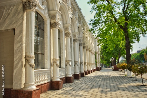 The building with Roman columns decorated with openwork stucco. Spring cityscape