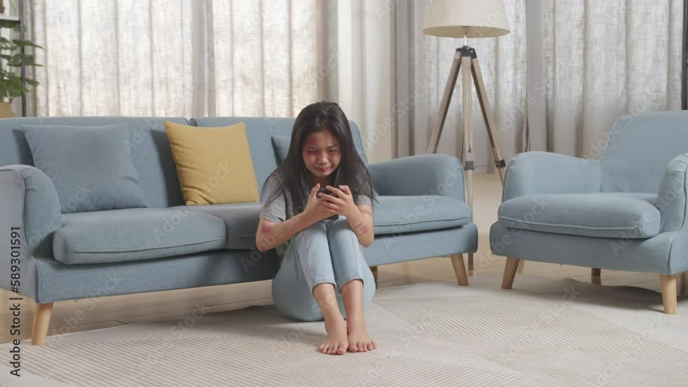 Full Body Of Young Asian Woman Victim Of Violence With Bruise On Body Crying And Talking On Smartphone Asking For A Help While Sitting On The Floor At Home
Full Body Of Young Asian Woman Victim Of Violence With Bruise On Body Crying And Talking On Smartphone Asking For A Help While Sitting On The Floor At Home