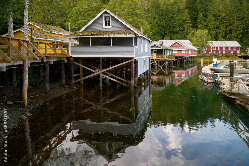 Telegraph Cove Historic Boardwalk Buildings on Pilings. The Telegraph Cove marina and accommodations built on pilings surrounding this historic location.

