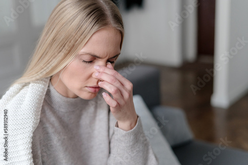 sick woman with sinusitis and pressure feel unwell photo