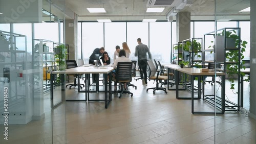 Timelapse of group of people that are working in the modern office together.