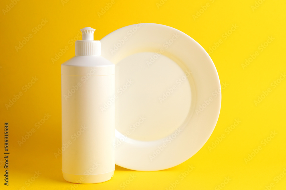 Dishwashing liquid on a colored background Dishwashing liquid on a colored background