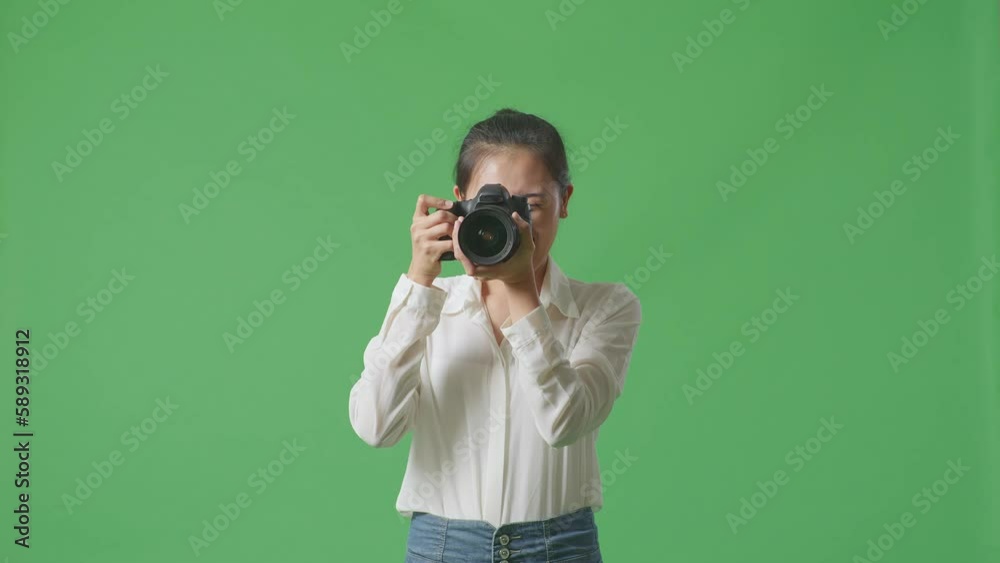 Asian Photographer Telling The Model To Move Left And Right While Taking Pictures By Camera On Green Screen Background In The Studio
Asian Photographer Telling The Model To Move Left And Right While Taking Pictures By Camera On Green Screen Background In The Studio