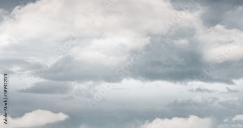 Photography General view of dark and white multiple clouds over gray sky