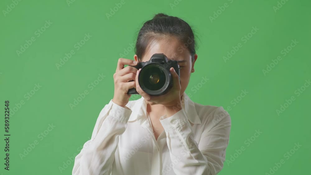 Close Up Of Asian Photographer Telling The Model To Move Left And Right While Taking Pictures By Camera On Green Screen Background In The Studio
Close Up Of Asian Photographer Telling The Model To Move Left And Right While Taking Pictures By Camera On Green Screen Background In The Studio