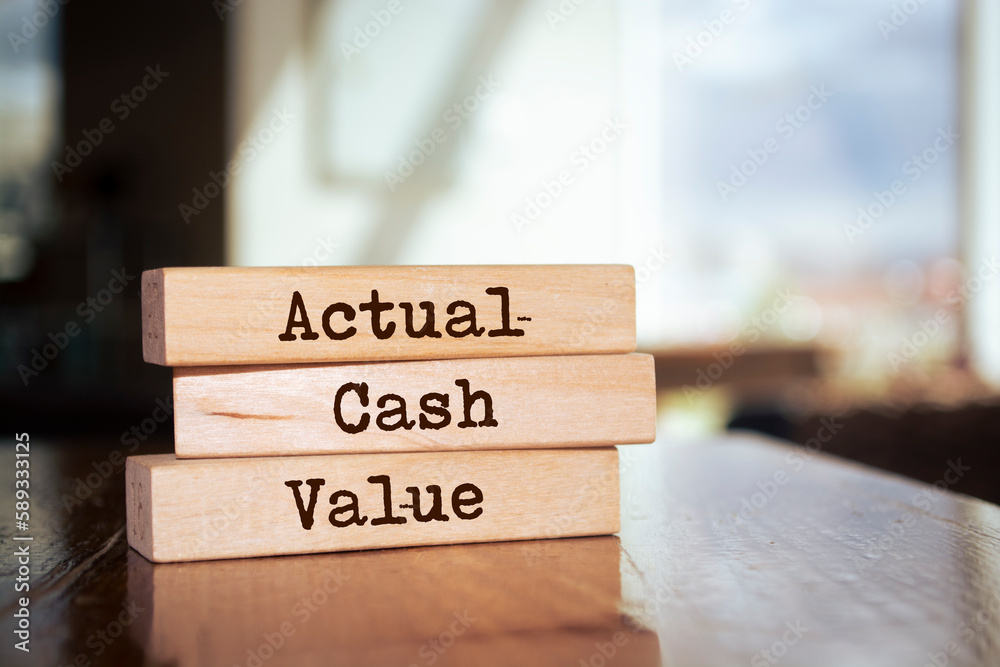 Wooden blocks with words 'Actual Cash Value'. Wooden blocks with words 'Actual Cash Value'.