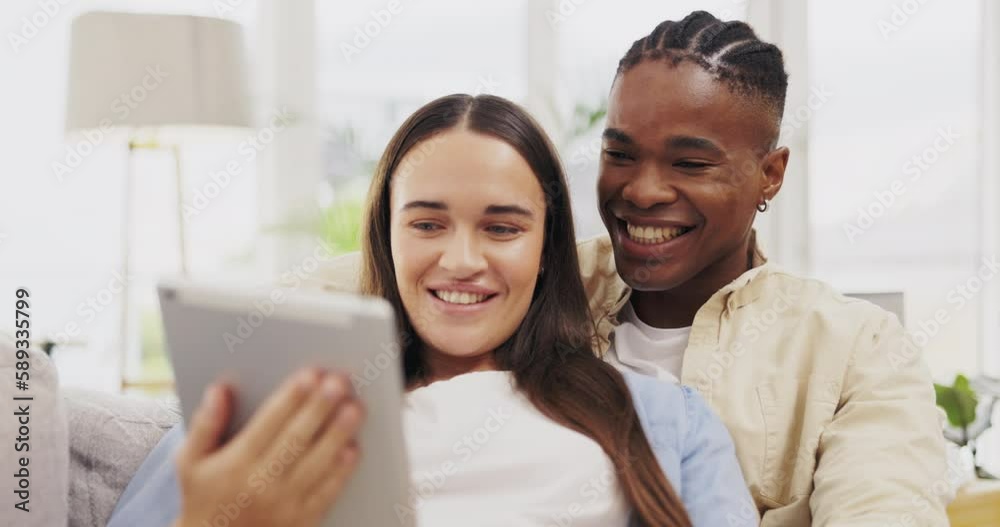Tablet, smile and couple relax in home living room on sofa, streaming funny video and laughing. Interracial, technology and happy black man and woman with touchscreen for social media or web browsing Tablet, smile and couple relax in home living room on sofa, streaming funny video and laughing. Interracial, technology and happy black man and woman with touchscreen for social media or web browsing
