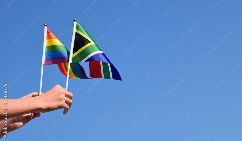 Isolated South Africa flag and rainbow flag with clipping paths Isolated South Africa flag and rainbow flag with clipping paths