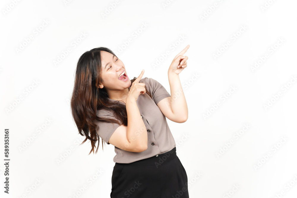 Showing Product and Pointing Blank Side using forefinger Of Beautiful Asian Woman Isolated On White Background Showing Product and Pointing Blank Side using forefinger Of Beautiful Asian Woman Isolated On White Background