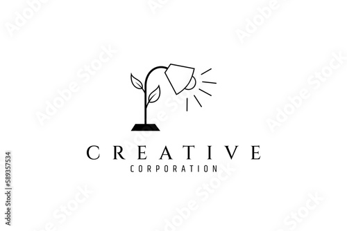 eco lamp, green light, desk lamp logo with leaf or plant shape