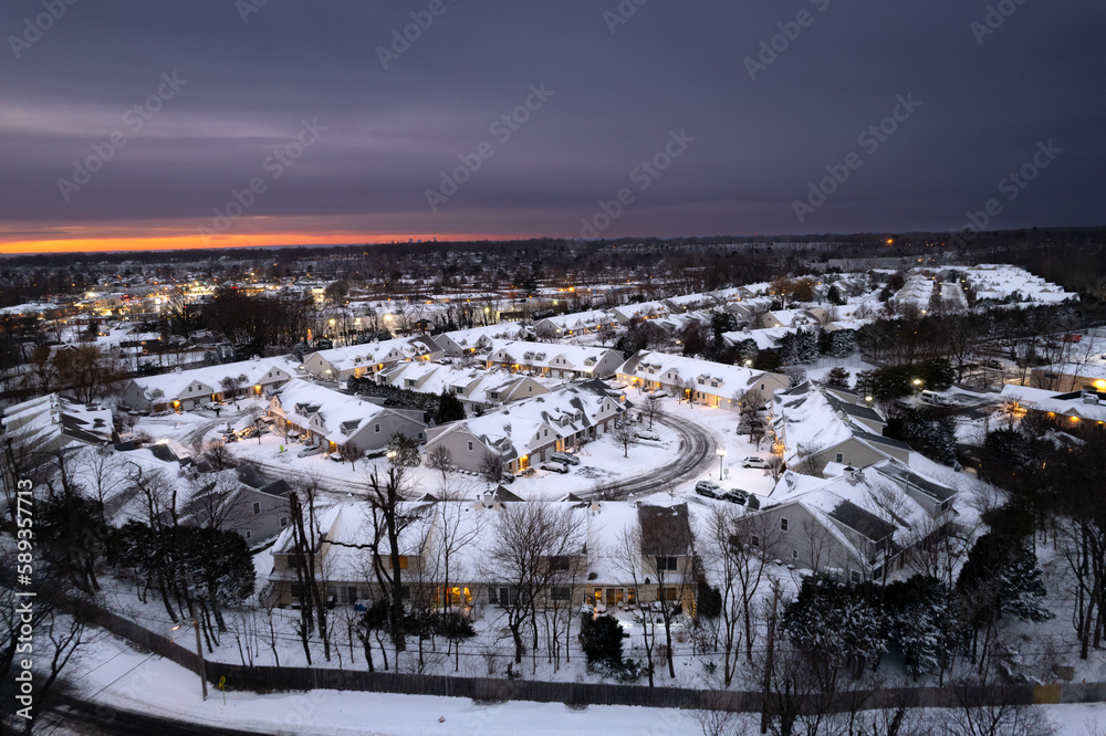 Beautiful sunset on American Village covered in snow