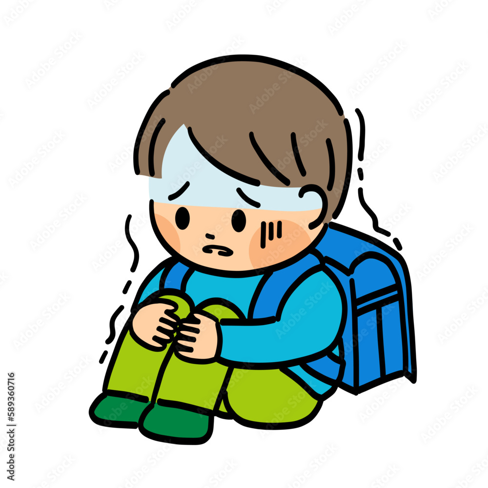 不安で震える男の子