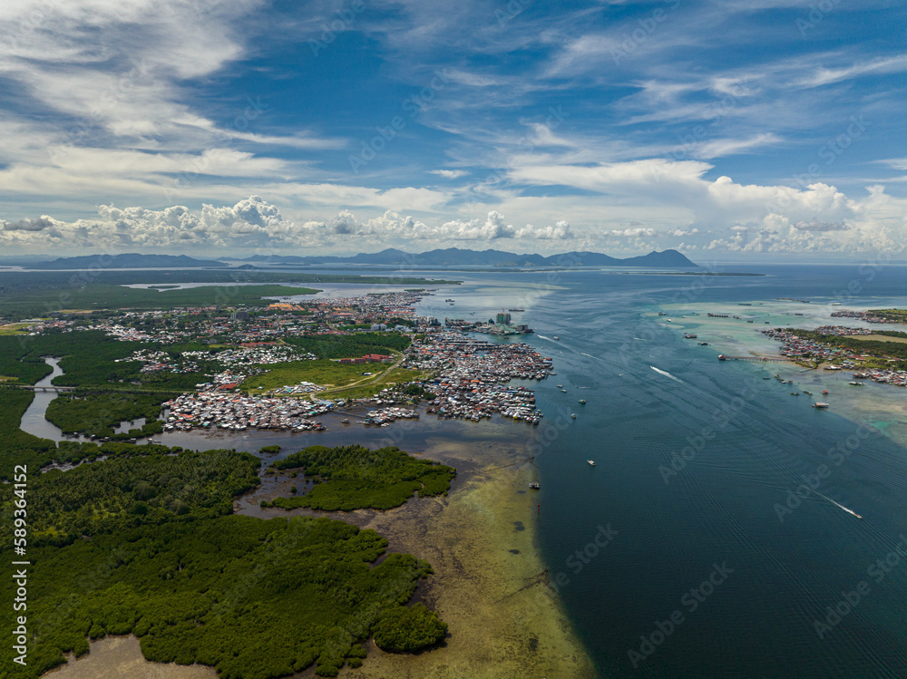 Panorama of the city of Semporna with residential buildings. Borneo, Sabah, Malaysia.
