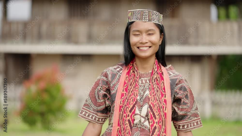 Young beautiful asian woman wearing traditional dress costume for celebration Young beautiful asian woman wearing traditional dress costume for celebration
