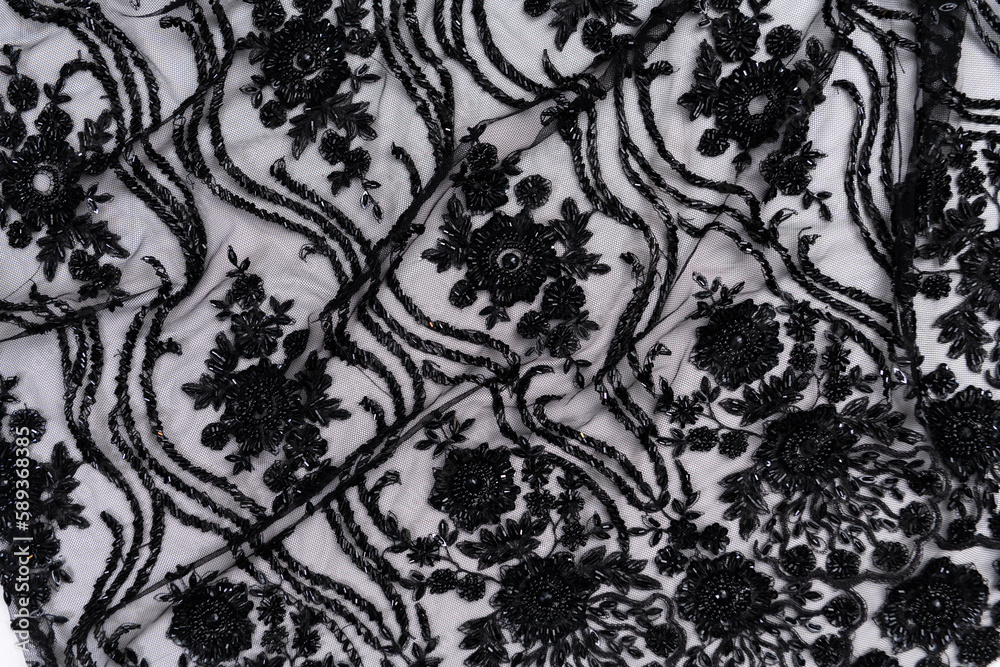 Collection of fashionable fabrics. Samples of different natural fabrics for sewing a fashion collection of clothes. Large selection of fabrics in the store or tailor warehouse. Collection of fashionable fabrics. Samples of different natural fabrics for sewing a fashion collection of clothes. Large selection of fabrics in the store or tailor warehouse.