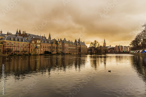 The Hague, Den Haag, Netherlands. Binnenhof at sunset with water reflection