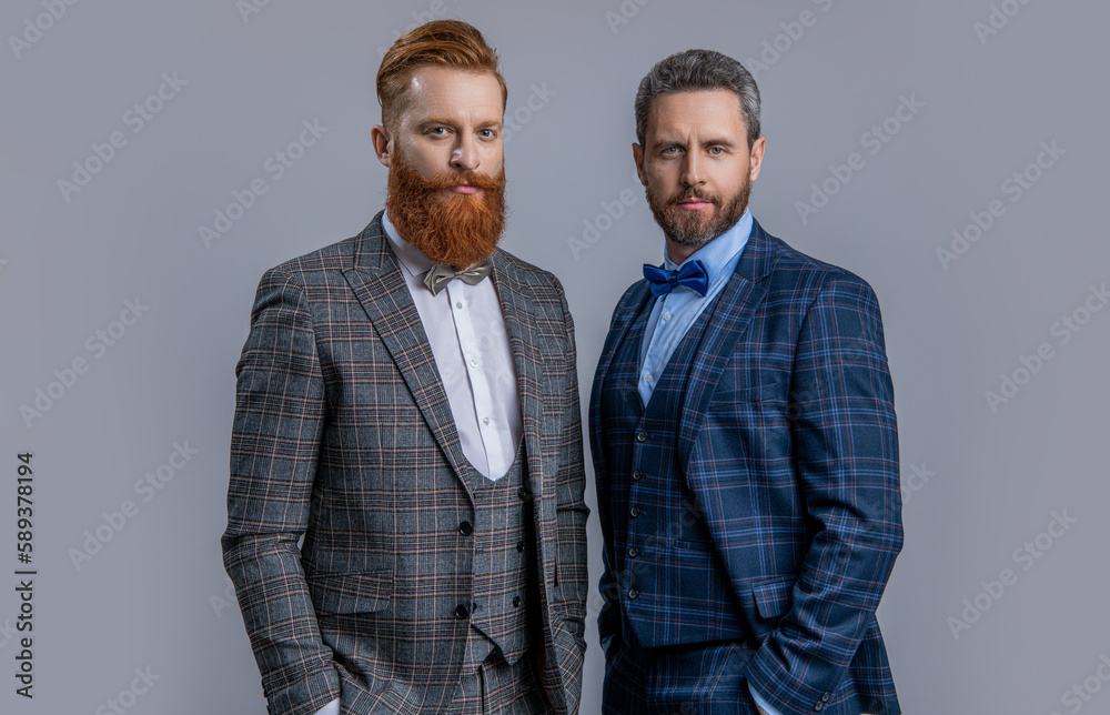 men in tuxedo bowtie isolated on grey. men in tuxedo at studio. men in tuxedo on background. men in tuxedo bowtie isolated on grey. men in tuxedo at studio. men in tuxedo on background.