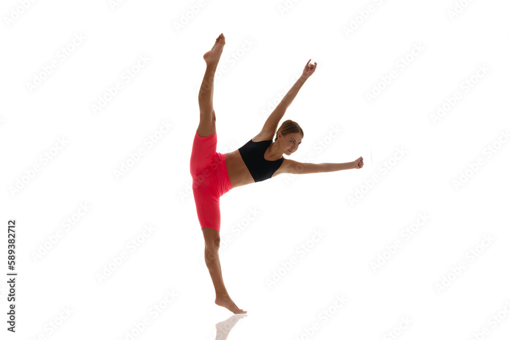 sport woman acrobat do split isolated on white. sport woman do split in studio.