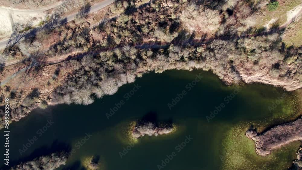 Aerial Drone View Of A Lake Near The Mountain Road Near Meijendel Dune Park In Wassenaar, Netherlands.