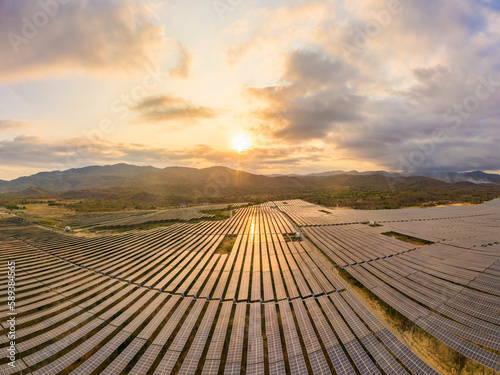 Aerial view of Solar panel, photovoltaic, alternative electricity source - concept of sustainable resources on a sunny day, Song Bieu lake, Ninh Thuan, Vietnam photo