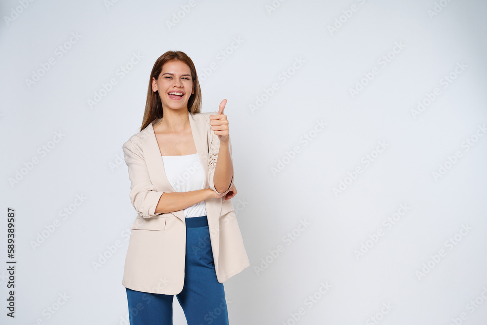 Young mixed race woman showing thumbs up isolated on white background. Young mixed race woman showing thumbs up isolated on white background.