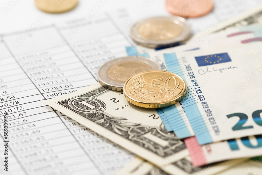 Business accounting, money and coins. Business accounting, money and coins.