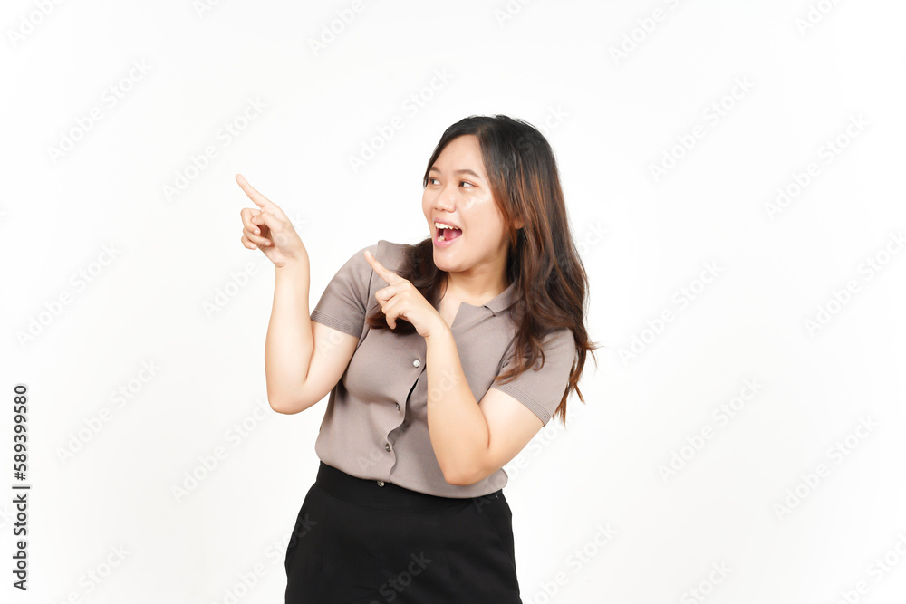 Showing Product and Pointing Blank Side using forefinger Of Beautiful Asian Woman Isolated On White Showing Product and Pointing Blank Side using forefinger Of Beautiful Asian Woman Isolated On White