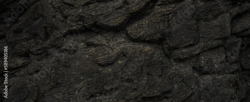 Natural black stone wall texture background