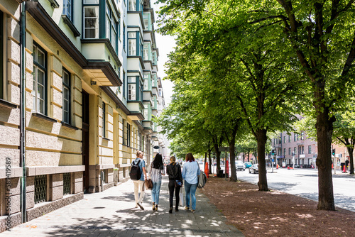 Wallpaper Mural Students walking together on street outside library. Torontodigital.ca