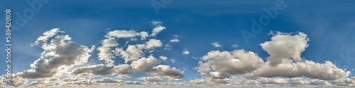 blue sky with cumulus clouds as seamless hdri 360 panorama with zenith in spherical equirectangular projection may use for sky dome replacement in 3d graphics or game development and edit drone shot