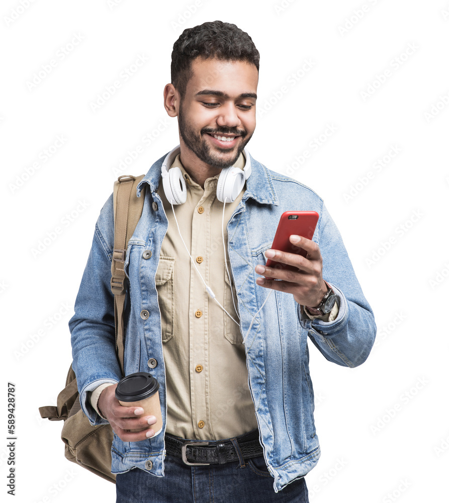 Young handsome man with backpack looking at smart phone and holding coffee cup isolated transparent PNG, Smiling student going on travel - obrazy, fototapety, plakaty 