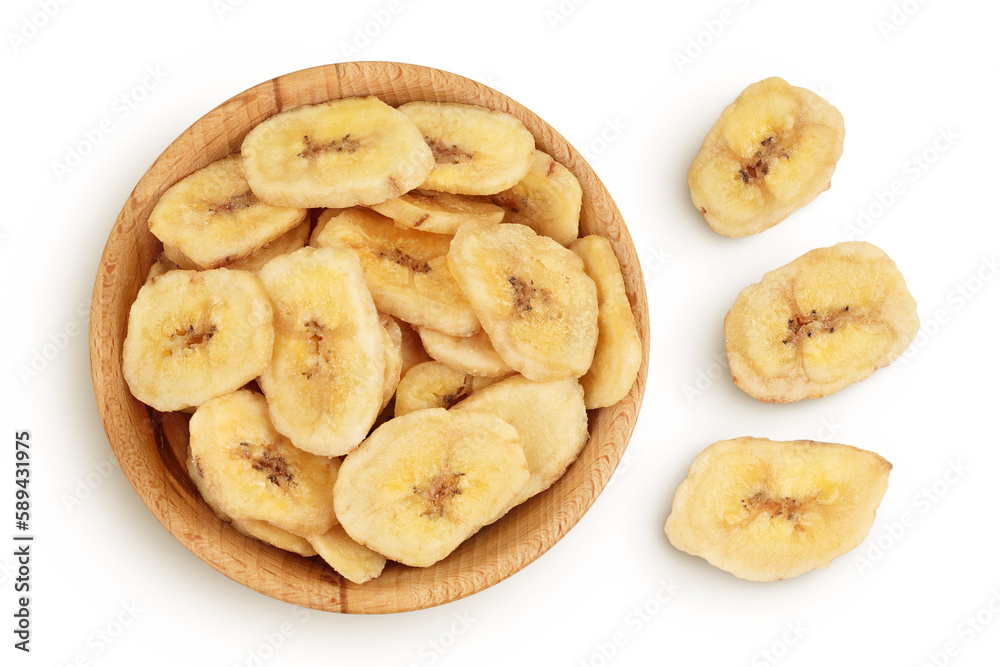 Dried banana chips in wooden bowl isolated on white background with full depth of field. Top view. Flat lay Dried banana chips in wooden bowl isolated on white background with full depth of field. Top view. Flat lay