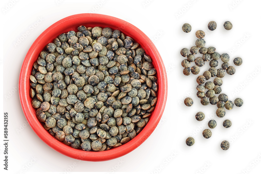 raw french green lentils in ceramic bowl isolated on white background. Top view. Flat lay raw french green lentils in ceramic bowl isolated on white background. Top view. Flat lay