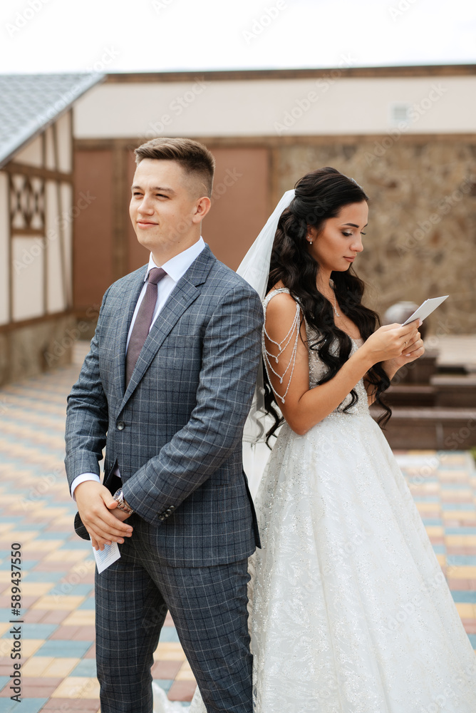 the first meeting of the bride and groom in the courtyard of the hotel the first meeting of the bride and groom in the courtyard of the hotel