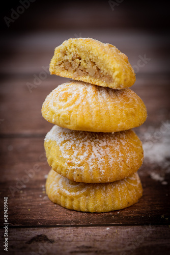 Traditional eid maamoul or mamoul cookies with dates, nuts, and jam, Arabic sweets for Aid al-Fitr and easter, High quality photo photo