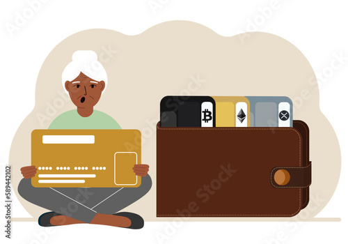 A woman holds a card, next to a wallet with different cards for cryptocurrencies. Internet wallet, digital money transactions, exchange platform, cold wallet or hardware wallet.