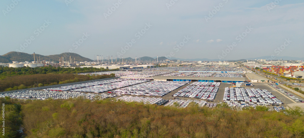 Aerial top view of new cars parking for sale stock lot row, dealer inventory import and export business commercial worldwide, Automobile and automotive industry distribution logistic global transport