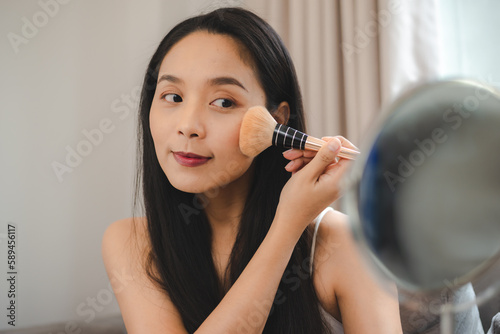 young Asian woman with beauty face skin  female pretty and cosmetic spa makeup