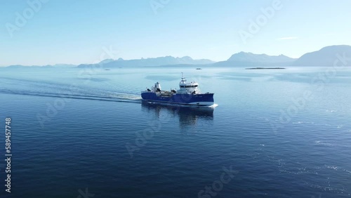 The salmon boat entering Harstad Harbour photo