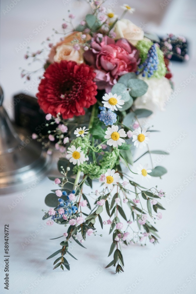 Vertical shot of a beautiful bouquet of different colorful flowers.