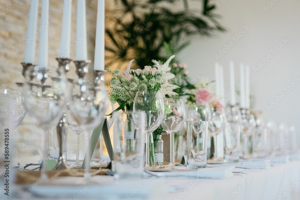 Closeup of wedding table with candles and special design