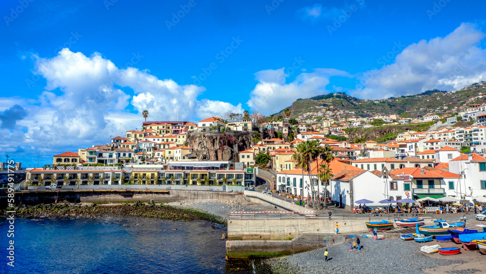 view of Camara de lobos city center, Madeira, Portugal on sunny winter day in february