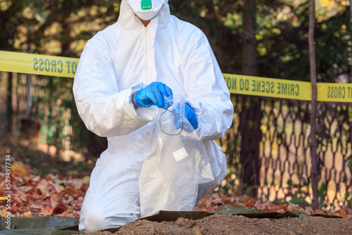 Fotografie Forensic science specialist at work at a war crime scene investigation