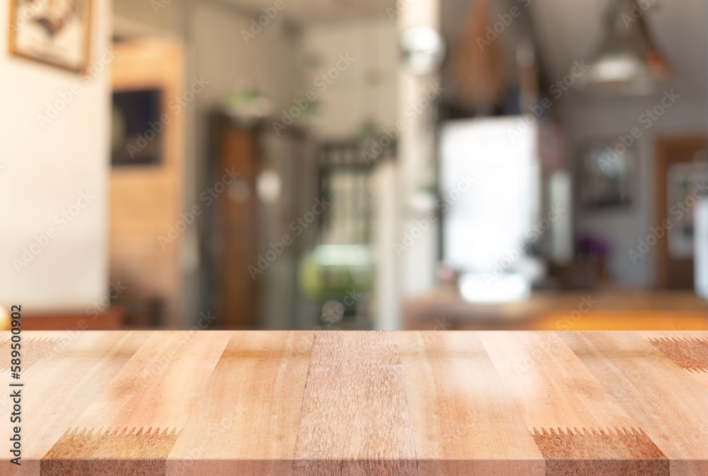 Empty wooden table top with lights bokeh on blur restaurant background. Empty wooden table top with lights bokeh on blur restaurant background.