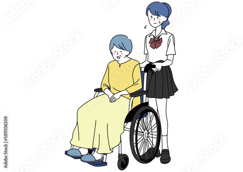 祖母の車いすを押す疲れた女子高校生