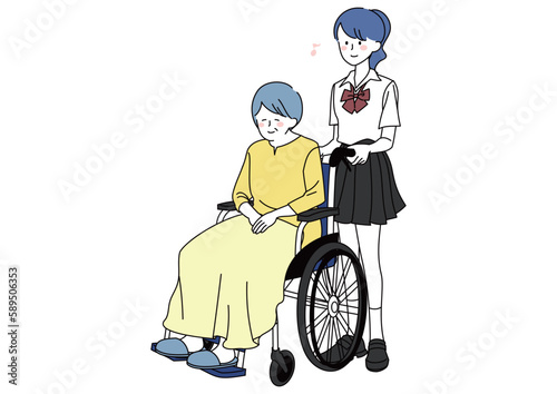 祖母の車いすを押す女子高生