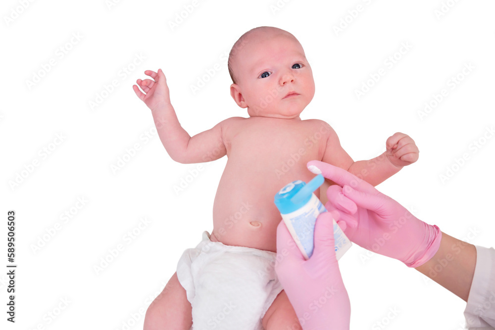The doctor smears a cream on the skin of a newborn baby, isolated on a white background. Dermatologist nurse in uniform The doctor smears a cream on the skin of a newborn baby, isolated on a white background. Dermatologist nurse in uniform