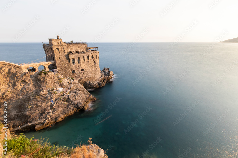 View of Torre Normanna, a medieval tower along Salerno Bay in Maiori, Amalfi Coast, Salerno, Italy. View of Torre Normanna, a medieval tower along Salerno Bay in Maiori, Amalfi Coast, Salerno, Italy.