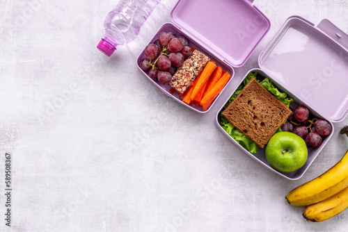 Set of lunch boxes filled with healthy food. Healthy meal